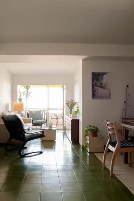 a living room with chairs and a table at Apartment near the beach and Port Marina of Premia in Premiá de Mar