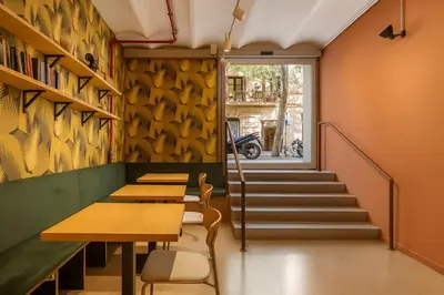 a bunk bed in a small room with a window at The Loft House Barcelona in Barcelona