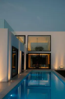 a swimming pool in the middle of a house at Contemporary villa near Sitges Hills in Avinyonet