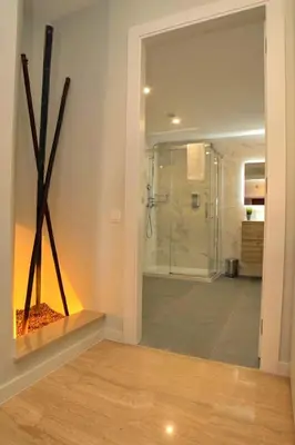 a bathroom with a walk in shower and a walk in shower at Can Mir Badalona in Badalona