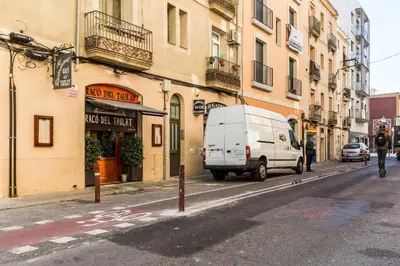 an empty street in a city with buildings at Estudio Bogatell Beach Se admiten mascotas AC in Barcelona
