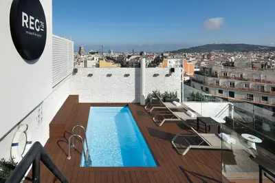 a group of tables with bottles of water on them at HCC Regente in Barcelona
