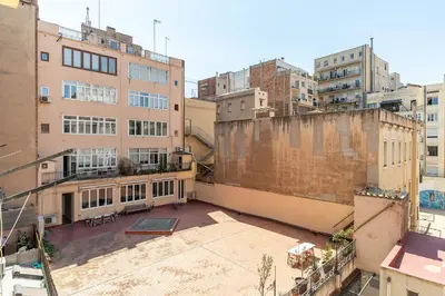 an aerial view of a city with tall buildings at Canela Homes BARCELONA CASP in Barcelona