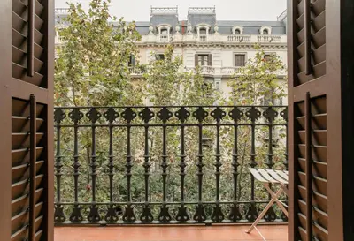 a balcony with a view of a building at Canela Homes BARCELONA CASP in Barcelona