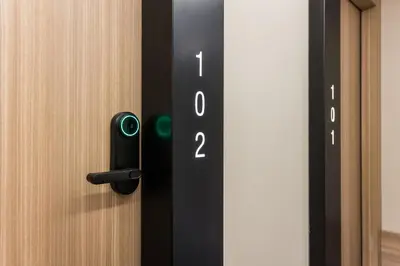 a black door with the wordpolice written on it at Royal Ramblas in Barcelona