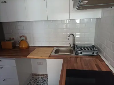 a kitchen with a sink and a counter top at COOL! 5' to metro. 15' to Center/beach by metro. in Santa Coloma de Gramanet