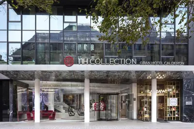 a building with the mitt collections sign on it at NH Collection Barcelona Gran Hotel Calderon in Barcelona