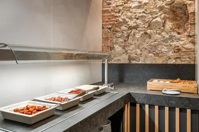 a kitchen with some food on a counter at Ronda House in Barcelona