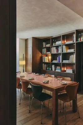 a dining room with a long table and chairs at Hotel Casa Teva Barcelona in Barcelona