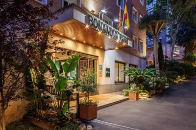 a building with a sign on the side of it at Bonanova Park in Barcelona