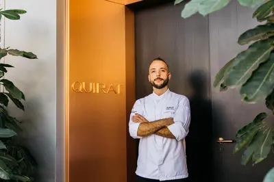 a man standing in a doorway with his arms crossed at InterContinental Barcelona by IHG in Barcelona