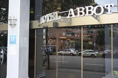 a building with a sign on top of it at Hotel Abbot in Barcelona