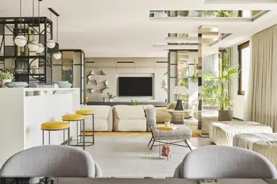 a living room with a couch and chairs at Grand Hyatt Barcelona in Barcelona