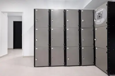 a row of lockers in a room with a door at htop BCN City #htopEnjoy in Barcelona