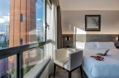 a hotel room with a bed and a window at Attica 21 Barcelona Mar in Barcelona