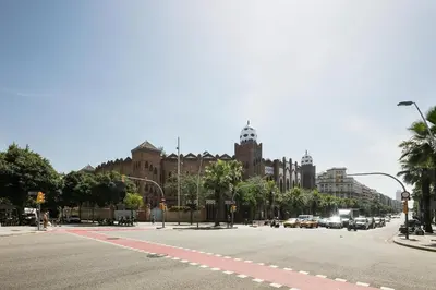 an empty street in front of a large building at Hotel Best Aranea in Barcelona