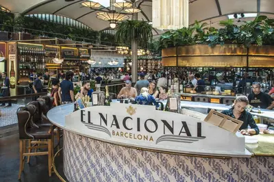 a large restaurant with a boat on the counter at Habitat Apartments La Bohème in Barcelona