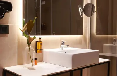 a bathroom with a white sink and a mirror at Acta Splendid in Barcelona