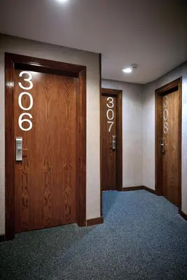 a row of doors with the word order on them at ITC Barcelona By Soho Boutique in Barcelona
