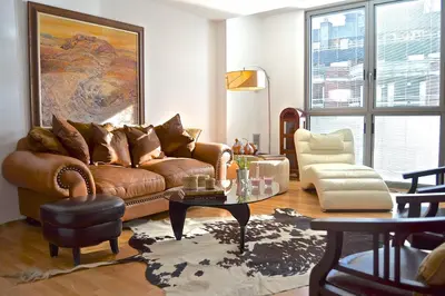 a living room with a couch and a table at Livingstone in Barcelona