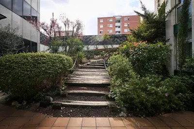 a set of stairs in the middle of a building at Catalonia Bristol in Sant Andreu de la Barca
