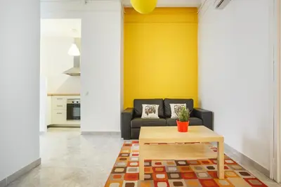 a living room with a couch and a coffee table at Barcelona Just Like Home in Barcelona