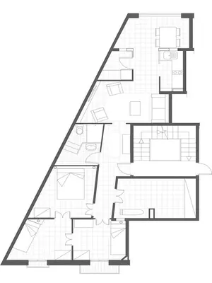 a triangle floor plan of a house at Barcelona Just Like Home in Barcelona