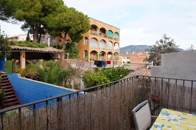 a view of a building from a balcony at Alojamiento con encanto en planta superior ideal para trabajo y escapadas familiares en Montserrat in Esparreguera