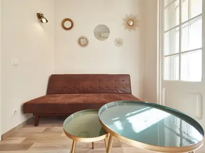 a living room with a glass table and a couch at BarcelonaForRent The Living Terrace in Barcelona