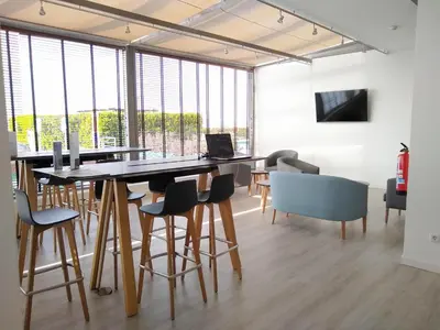 a large dining room with a table and chairs at Augusta Barcelona Vallès in Granollers