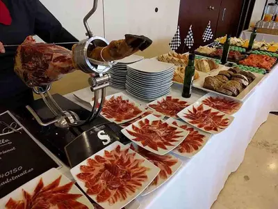 a table topped with food and a telescope at Augusta Barcelona Vallès in Granollers