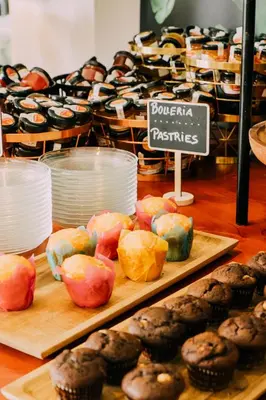 a display of different types of pastries in a bakery at Hotel Subur Maritim in Sitges