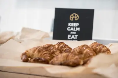 a bunch of pastries on a plate on a table at Sallés Hotel Pere IV in Barcelona