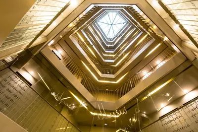 a ceiling of a building with a window at Sercotel Amister Art Hotel Barcelona in Barcelona
