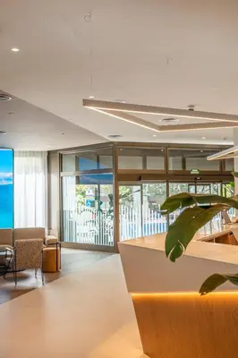an office lobby with a view of the ocean at Hesperia Barcelona Sant Just in Sant Just Desvern