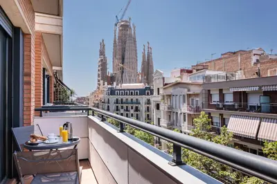 a balcony with a table and a view of the city at Apartaments Marina - Abapart in Barcelona