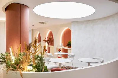 a conference room with tables and chairs and a laptop at Vincci Maritimo in Barcelona