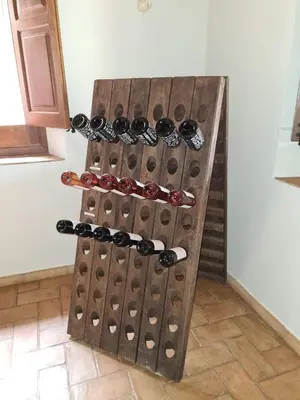 a wine cellar with a bunch of wine bottles at Cal Colina - Karaktervol landhuis met privé zwembad in Pacs del Penedes