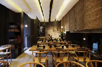 a dining room with a long table and chairs at Axel Hotel Barcelona - Adults Only in Barcelona