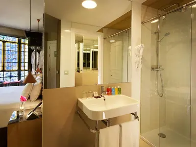 a bathroom with a sink and a shower at Axel Hotel Barcelona - Adults Only in Barcelona