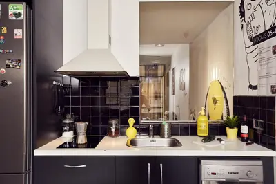 a kitchen with a sink and a counter top at Free Hostels Barcelona in Barcelona