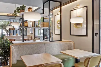 a restaurant with two tables and two chairs at B&B HOTEL Barcelona Mollet Porta de Gallecs in Mollet del Vallès