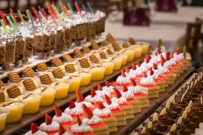 a display of desserts and drinks on a buffet at htop Pineda Palace 4Sup - Adults Only #htopBliss in Pineda de Mar