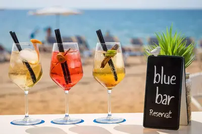 three wine glasses sitting on top of a table at htop Amaika & SPA 4Sup - Adults Only #htopBliss in Calella