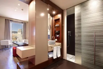 a bathroom with a sink and a shower at Olivia Plaza Hotel in Barcelona