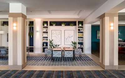 a dining room with a table and chairs at Eurostars Sitges in Sitges