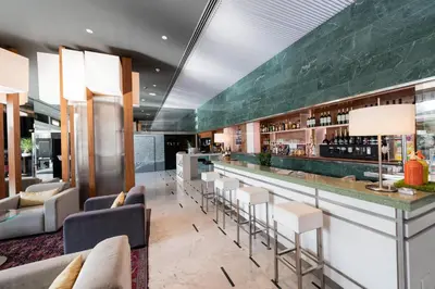 a lobby with an open door in a building at Aparthotel Atenea Barcelona in Barcelona
