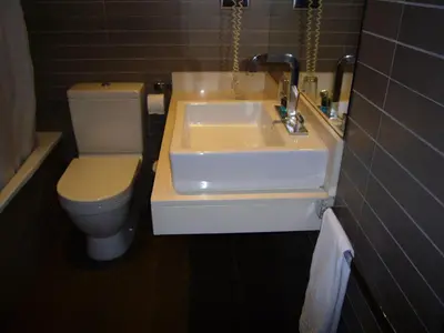 a bathroom with a sink and a toilet at Chic & Basic Zoo in Barcelona