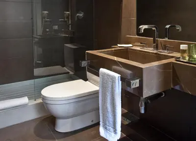 a bathroom with a toilet and a sink at Chic & Basic Zoo in Barcelona