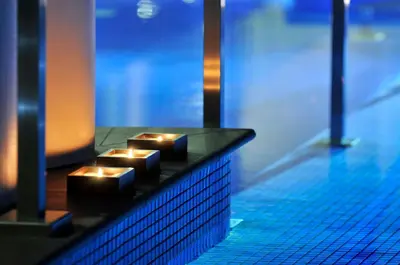 a row of lights on a counter in a pool at Sant Jordi Boutique Hotel in Calella